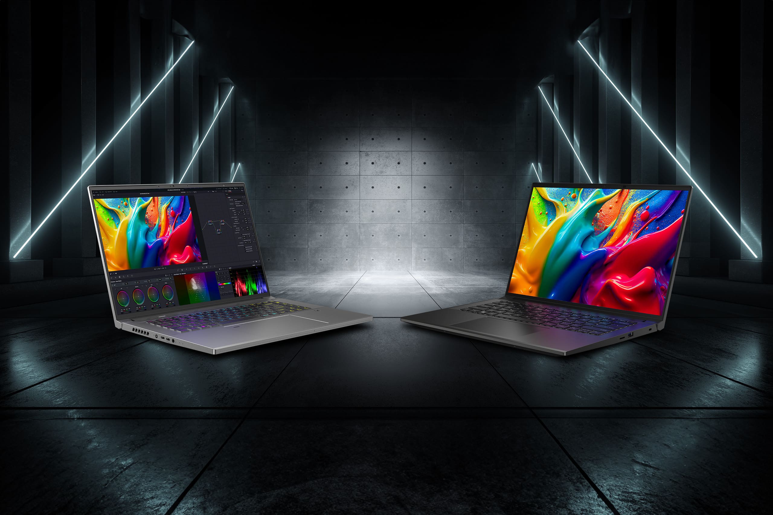 image with edgy black background, two acer monitors in view displaying multicolor image